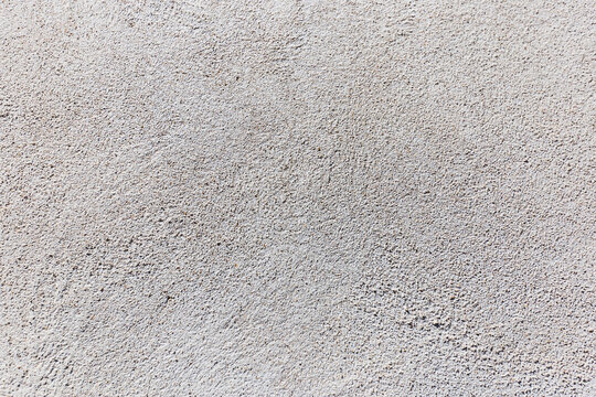 Enduit au sable et ciment blanc