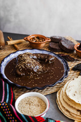 mole poblano is sauce with chicken mexican traditional food in Mexico Latin America