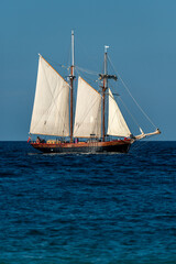 Fototapeta na wymiar old wooden sail ship , on the ocean off the coast of cornwall uk , portrait photo