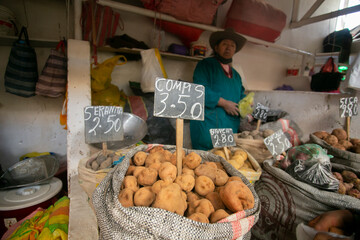 Variety of Peruvian potatoes in the central market of the city of Cusco in Peru.