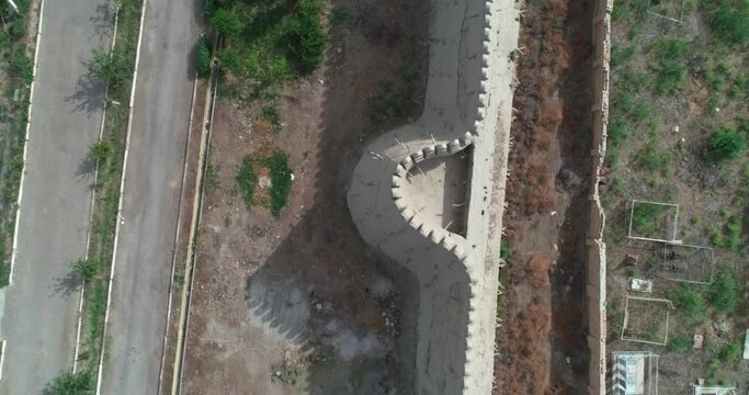 A drone flies over an ancient walled fortress in Bukhara near the Talipach Gate