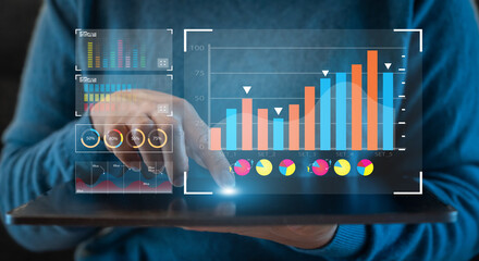 Analyst working with business analytics and data management system on computer, make a report with KPI and metrics connected to database. Corporate strategy for finance, operations, sales, marketing