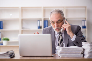 Old male employee and too much work in the office