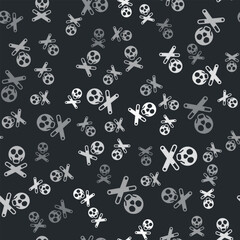Grey Bones and skull as a sign of toxicity warning icon isolated seamless pattern on black background. Vector