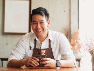 man drinking coffee in cafe