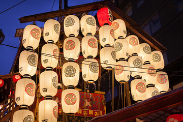 Minami-kannonyama float with lanterns and people playing Gion bayashi music at Yoiyama of Gion matsuri festival