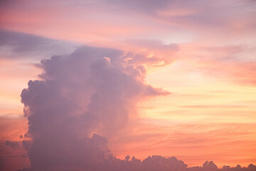 Beautiful sunset sky above clouds orange sunset sky. Beautiful sky. Dramatic red yellow pastel color at sunset.
