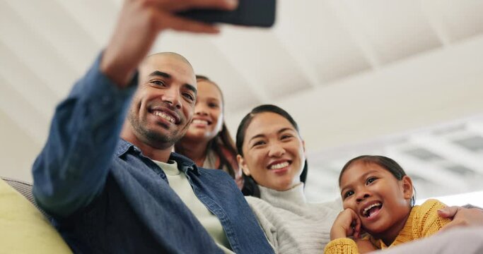 Family, selfie and children with parents on sofa for social media, online memory and happy together at home. Excited interracial people, kids with mother and father in profile picture or photography