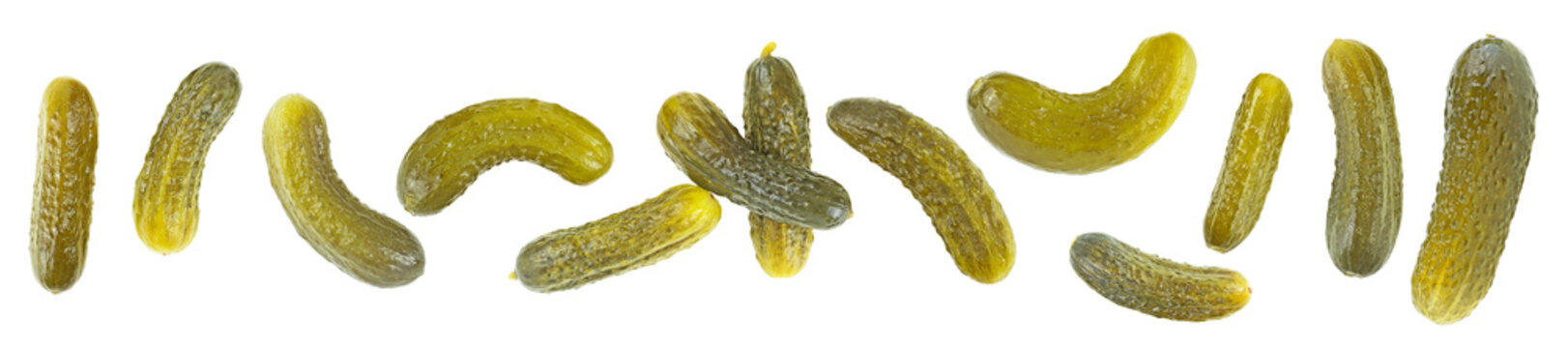 Group of pickled cucumbers isolated on a white background. Gherkins, top view.