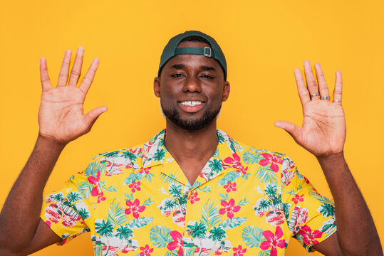 Positive black man showing hands