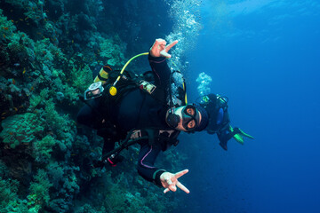 Scuba Diver Showing Peace Sign 