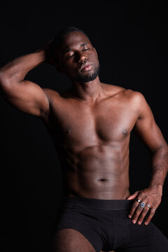 Serious black man with naked torso