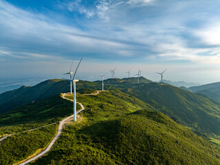 Wind farm on the mountain, blue sky and white clouds