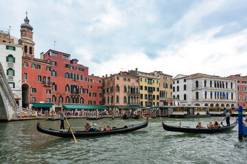 Venice, Italy - June 30, 2023: Canal Grande with Rialto Bridge in Venice.