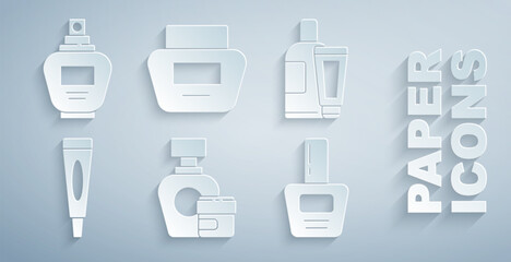 Set Cream or lotion cosmetic tube, Nail polish bottle, and Perfume icon. Vector