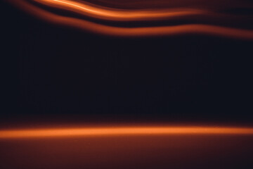 Long exposure. Abstract wallpaper with dark background. Glowing dynamic lines over dark background. Light drawing trajectory.