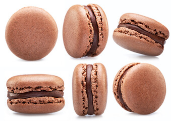 Chocolate french macaroon cookies isolated on white background.