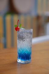 Blue Ocean Drink with Soda and Cherry Topping