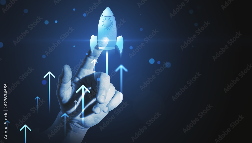Poster Close up of business man hand pointing at glowing flying blue rocket on dark background with mock up place. Start up and launch concept.