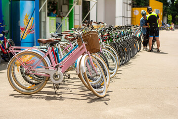 Row of bicycles waiting to be rented near exhibition