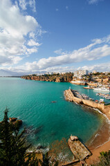 Fototapeta premium Landscape with sea marina and buildings on cliff. Antalya Turkey.