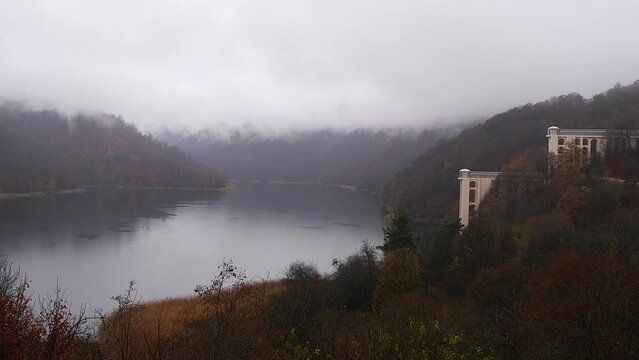 Rain cloud static shot: Goygol Lake resort overlooks mountain lake, AZE