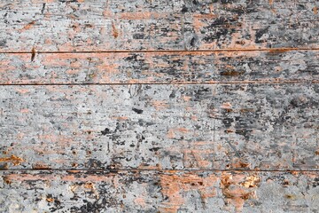 Wooden background. Light grey peeling paint wooden planks texture. Grunge wood vintage style background.