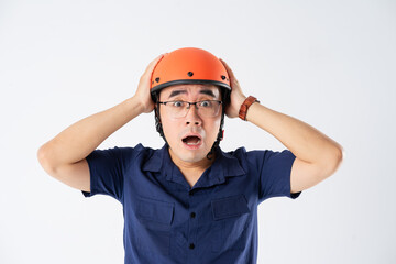 man wearing orange helmet on white background