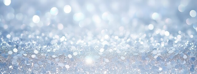Glitter background in pastel delicate silver light blue and white tones de-focused