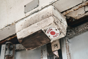 Push button on Old forgotten rusty Blackpool trams. Famous iconic seaside tourist attraction transport carriages. Rusting historic iconic trams rusting and rotting in a scrapyard.