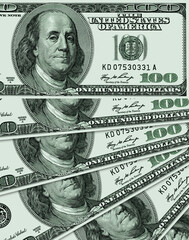 One hundred US dollar bills spread out like a fan
