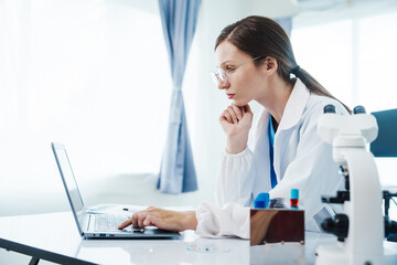 Health care researchers working in life science laboratory, Teaching in labs - Requiring students...