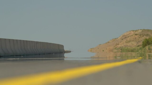 Mirage on the highway. Freeway in hot weather.