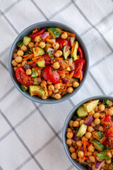 Homemade Avocado Chickpea Salad with Chili Lime Dressing in a Bowl, top view.