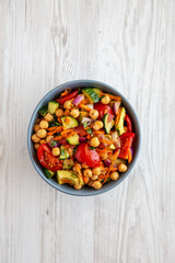 Homemade Avocado Chickpea Salad with Chili Lime Dressing in a Bowl, top view.