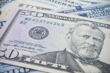 Portrait of Ulysses S. Grant president and Federal Reserve System (FED) seal macro detail on a fifty dollar banknote or bill. Concept of central bank and USA or world economic financial.