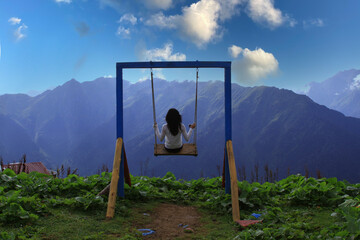 Girl on Swing in the Cloud Sea, Gito Plateau Camlihemsin, Rize Turkey