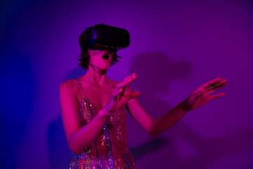 Photo of amazed lady gamer playing on birthday event occasion see visual effect illusion wear vr box isolated neon color background