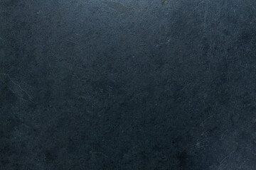 Seamless black concrete floor tile background