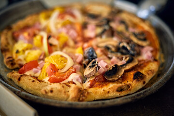 half pizza hawaiian and mushrooms