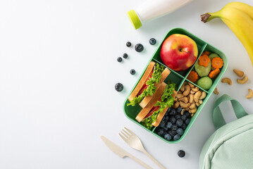 Wholesome lunchtime scene from a top-down perspective, showcasing a lunchbox with delightful...