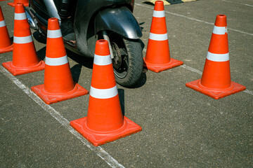 Man is learning to ride a bike Biker beginner on a motorcycle . Test Blance