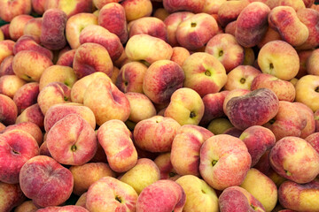 Showcase with fig peaches. Food market, close-up