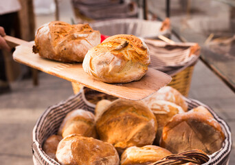 Ruddy rolls of fresh warm grain bread