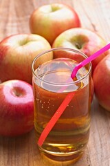 Refreshing Apple Juice: Close-Up in 4K with Fresh Apple Background