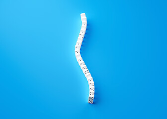 3d Curved Line Of White Domino Tiles Isolated On Blue Background 3d Illustration