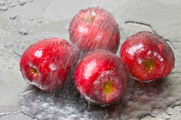 Refreshing and Crisp: Close-Up of Washing a Fresh Apple in 4K Resolution