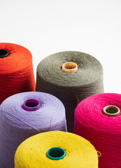 three spools of thread