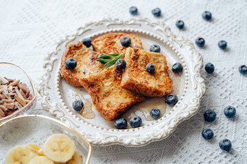 French Toast with blueberry banana and almonds