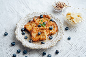 French Toast with blueberry banana and almonds